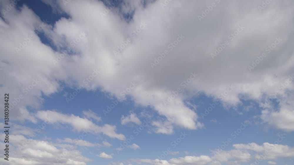 Living Sky: Dance of Clouds on a Clear Day Living Sky: Dance of Clouds on a Clear Day