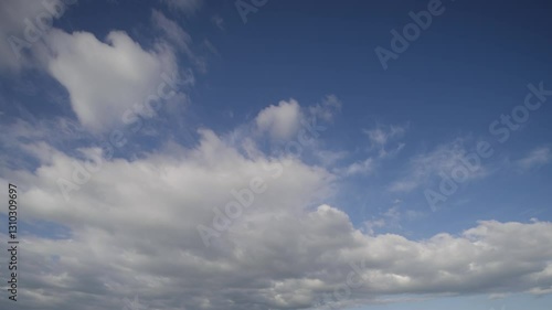Living Sky: Dance of Clouds on a Clear Day