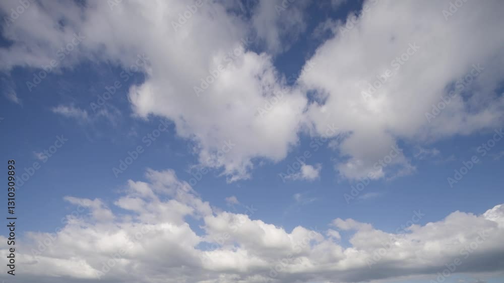 Living Sky: Dance of Clouds on a Clear Day Living Sky: Dance of Clouds on a Clear Day