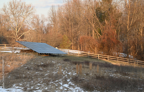 Solar Panel Array in field on ground mount in country in winter