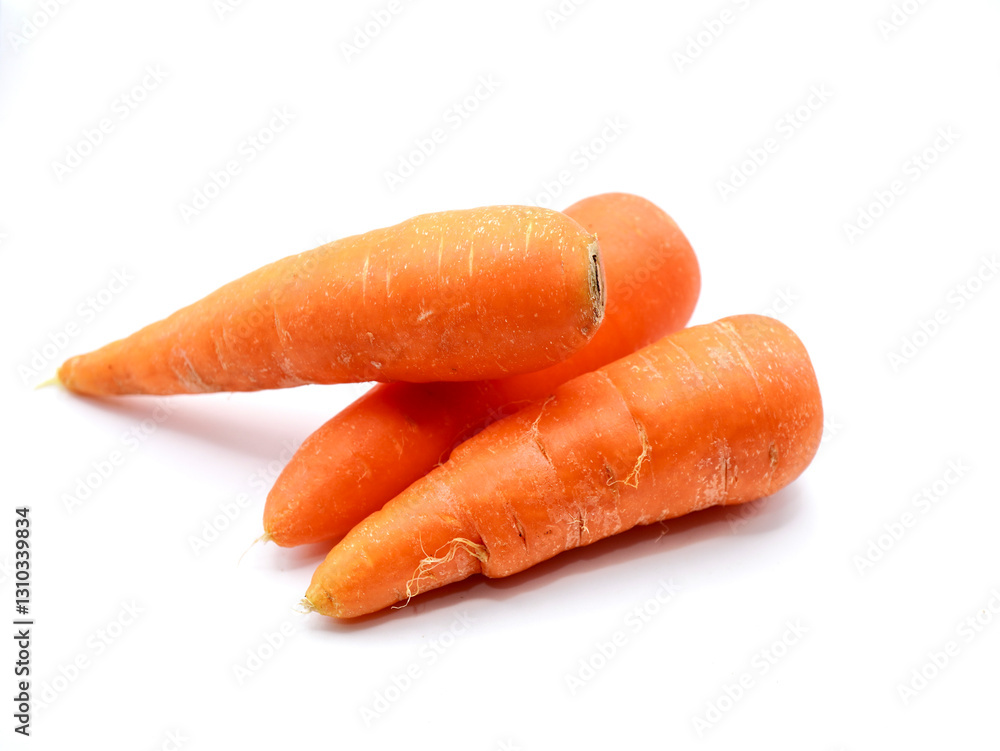 A fresh, vibrant carrots rests against a clean white background, showcasing its bright orange color and smooth, firm texture A fresh, vibrant carrots rests against a clean white background, showcasing its bright orange color and smooth, firm texture