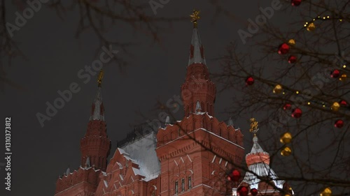 State Historical Museum in Moscow celebrating New Year with christmas decorations and snow at night
