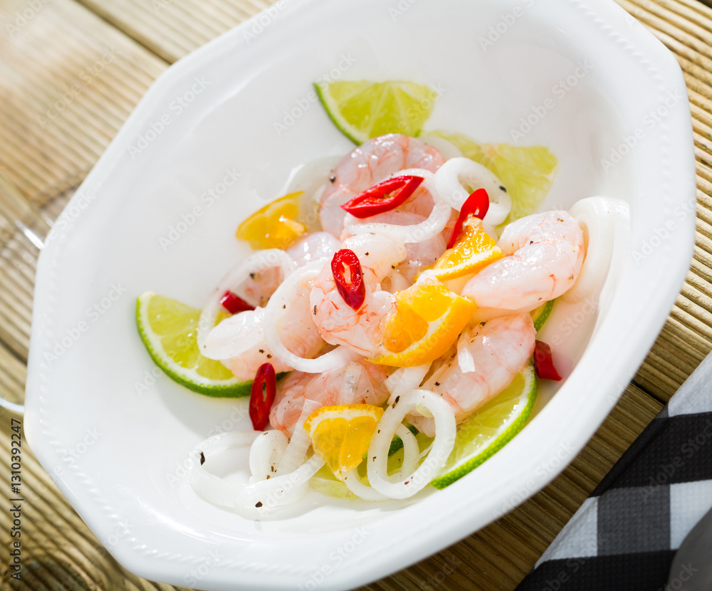 Delicious ceviche with shrimp, lime, onion and spicy pepper Delicious ceviche with shrimp, lime, onion and spicy pepper
