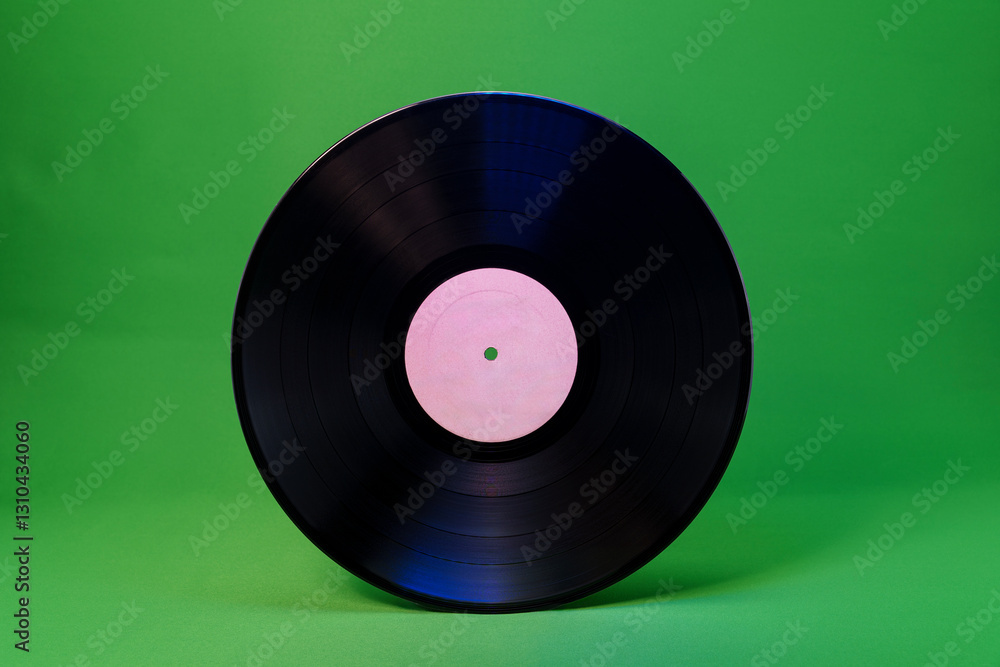 Obraz premium Blank vinyl record with white label on green background