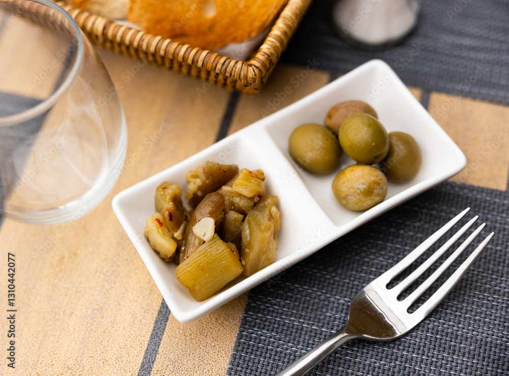 Pickled eggplant and olives appetizer closeup Pickled eggplant and olives appetizer closeup