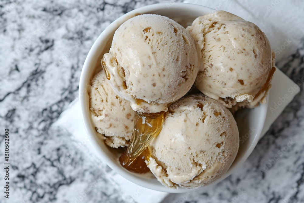Delicious Honey Almond Ice Cream Scoops in Bowl Delicious Honey Almond Ice Cream Scoops in Bowl