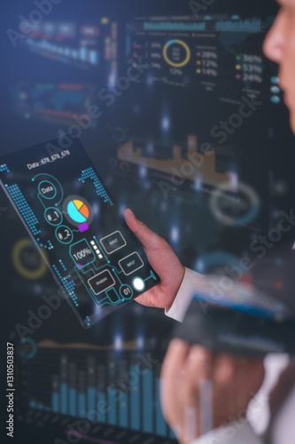Businessman holding digital tablet checking diagram or data chart technology and science in concept of data analysis. Data scientist querying, analysing and visualizing complex set on virtual screen