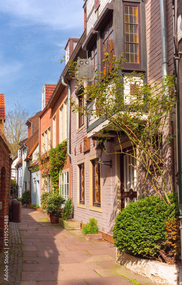 Narrow cobbled street in the historic Schnoor district of Bremen, with old houses, Germany