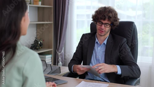 Wallpaper Mural Businesswoman giving white envelope with a lot of money to businessman and shaking hands for make a deal in the office Torontodigital.ca