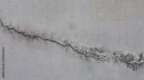 single line crack in the wall
