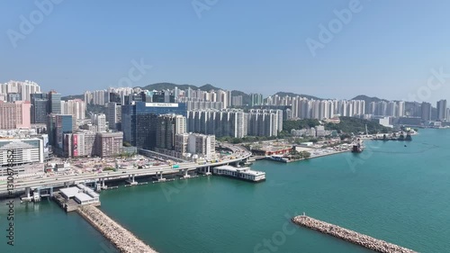 Aerial shots of Hong Kong Kowloon Bay revitalized commercial district, showcasing transformed industrial buildings into modern office towers near Kai Tak and Kwun Tong