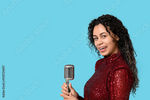 Smiling young woman holding...