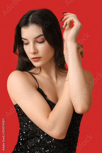 Beautiful young woman in st...