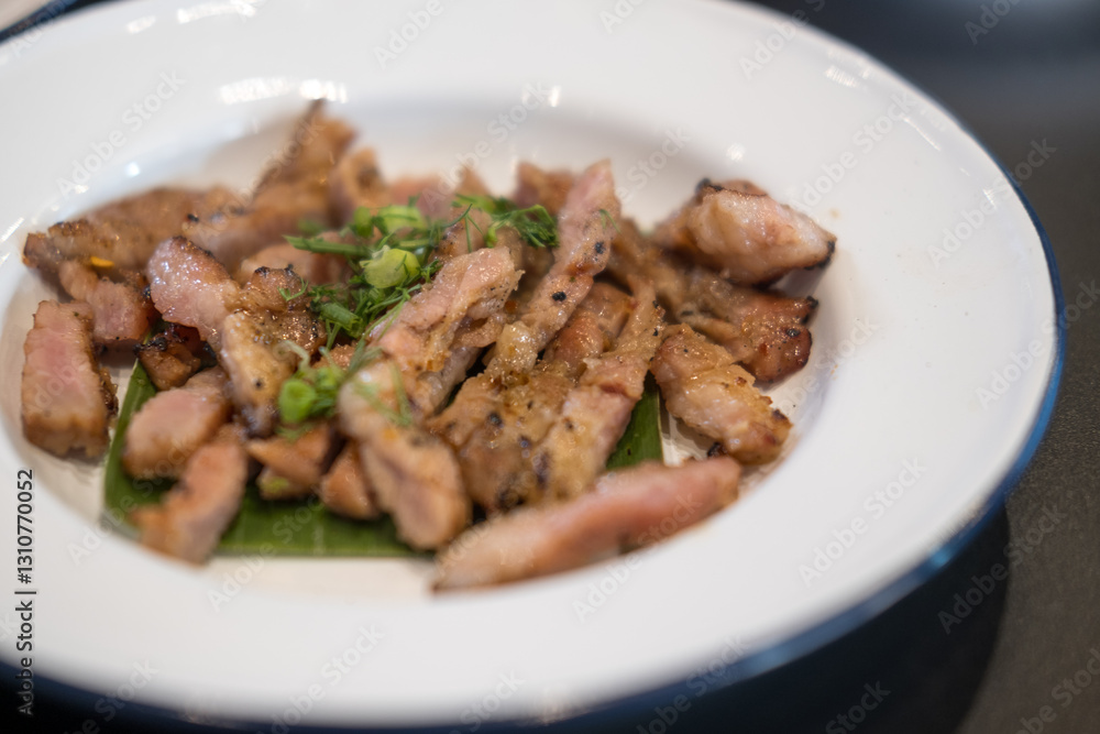 Thai slice of juicy grilled beef. Thai food style for eating with Somtum. Thai grilled beef brisket Thai slice of juicy grilled beef. Thai food style for eating with Somtum. Thai grilled beef brisket