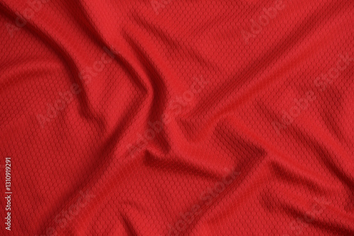 Texture of red jersey clothing fabric. Flatlay style, close up, studio shot. Sport background. Fabric commonly used for sportswear as football, basketball, volleyball, hockey, rugby etc