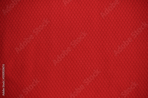 Texture of red jersey clothing fabric. Flatlay style, close up, studio shot. Sport background. Fabric commonly used for sportswear as football, basketball, volleyball, hockey, rugby etc