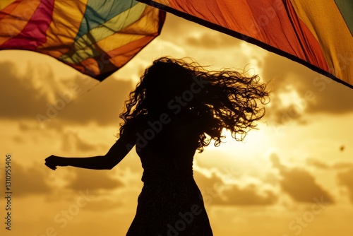 Elegant female face in the sunset dancing with a kite, kite fabric background.