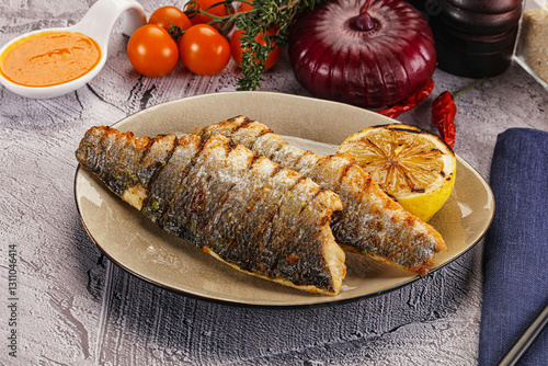 Fotografija Grilled seabass fillet with lemon