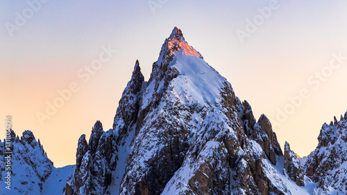 Wallpaper Mural the illuminated peaks of snow-capped mountains in Italy. Dolomites in winter at sunset. Italian mountains under snow lit by the sun. Rocky mountains. Winter in the Dolomites Torontodigital.ca