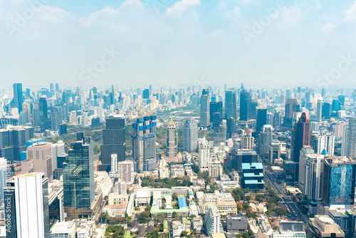 Bangkok, Thailand - Febuary 2, 2025: BTS Chong Nonsi interchange skywalk, Sky Transit, Urban view with dusk air
