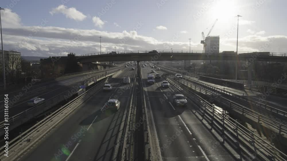 Centre Framed Busy Highway With Sun Providing Lens Flares Centre Framed Busy Highway With Sun Providing Lens Flares