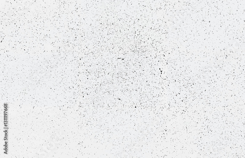 A minimalist black and white grunge texture with scattered speckles and noise for backgrounds and designs.