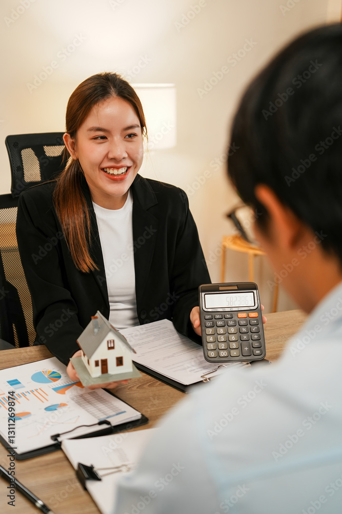 Businesswoman embraces client after successful property negotiation. Businesswoman embraces client after successful property negotiation.