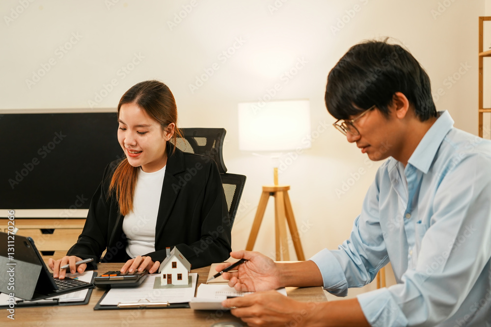 Businesswoman embraces client after successful property negotiation. Businesswoman embraces client after successful property negotiation.