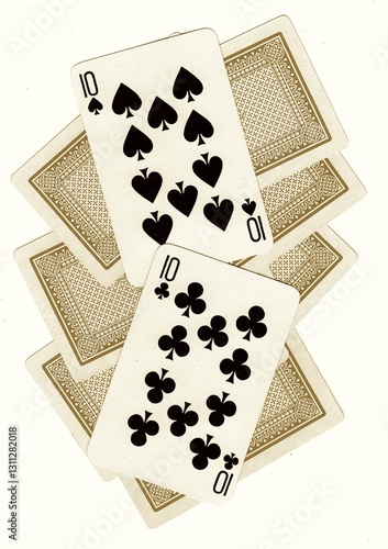 Photography A montage of playing card backs with a pair of tens revealed in sepia