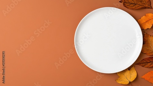 A Thanksgiving dinner invitation card with autumn leaves and warm tones