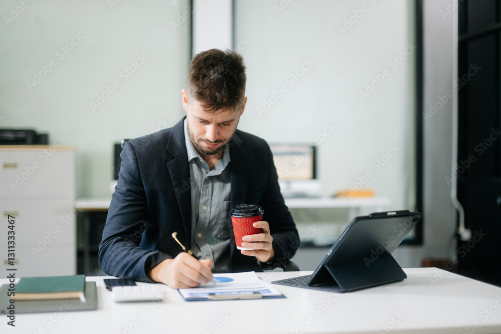 business man executive manager looking at laptop watching online webinar training or having virtual meeting video conference business man executive manager looking at laptop watching online webinar training or having virtual meeting video conference