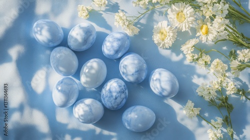 pastel blue easter eggs and white flowers