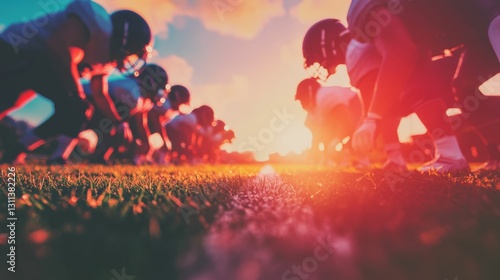 Football players lining up at the scrimmage line, intense expressions and vibrant field setting under natural light