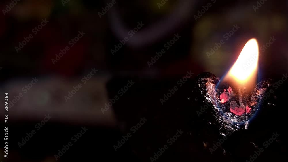 Organic diya lamps made from clay filled with oil and lit to celebrate the hindu festival
