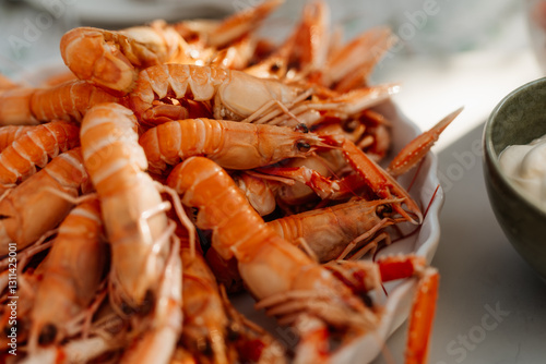 Freshly boiled crayfish served on a platter, traditional Swedish summer seafood