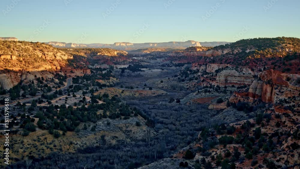 Drone soars above deep canyons near Kanab, Utah, as the first light of day emerges. Drone soars above deep canyons near Kanab, Utah, as the first light of day emerges.