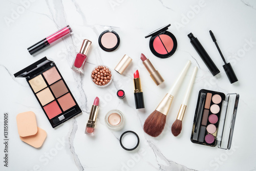 Make up products at white marble background.