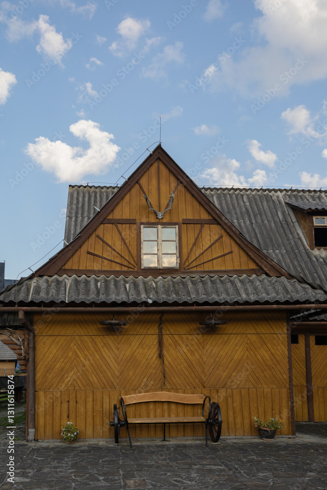 wooden houseon background blue sky