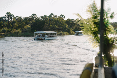 Tourists enjoying a cruise on the Zambezi River in Zimbabwe