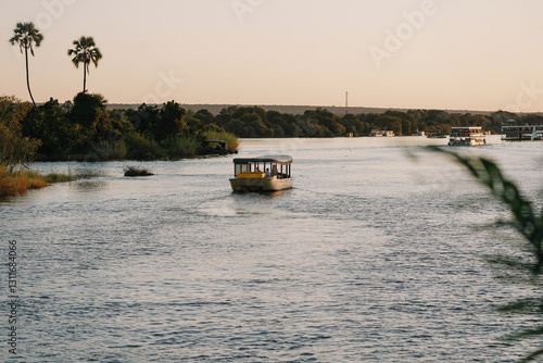 Tourists enjoying a cruise on the Zambezi River in Zimbabwe