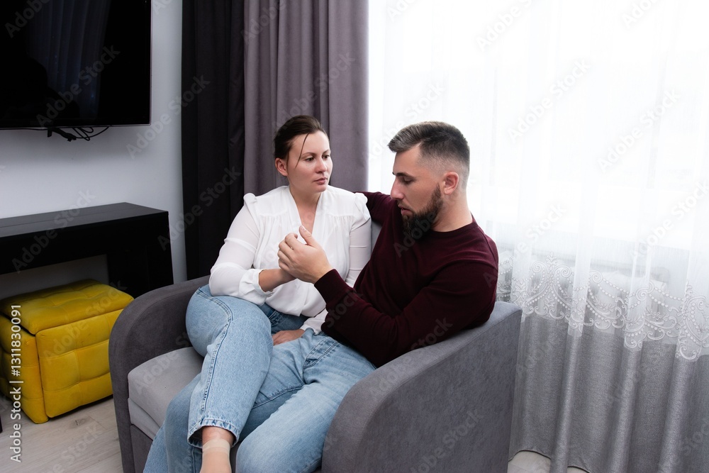 Couple sharing a quiet moment together in a cozy living room during the late afternoon light, creating a warm and intimate atmosphere Couple sharing a quiet moment together in a cozy living room during the late afternoon light, creating a warm and intimate atmosphere
