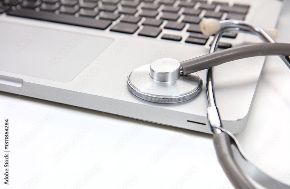 Telehealth, medical stethoscope and computer laptop on white