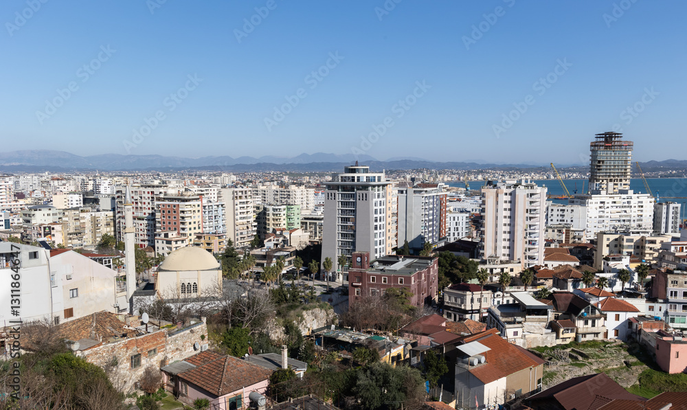 Beautiful coastline of the Albanian town. Scenic view of modern coastal city Durres from mountain view point. Beautiful coastline of the Albanian town. Scenic view of modern coastal city Durres from mountain view point.