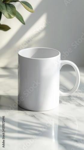 A white ceramic mug stands on a marble surface illuminated by sunlight with plant shadows