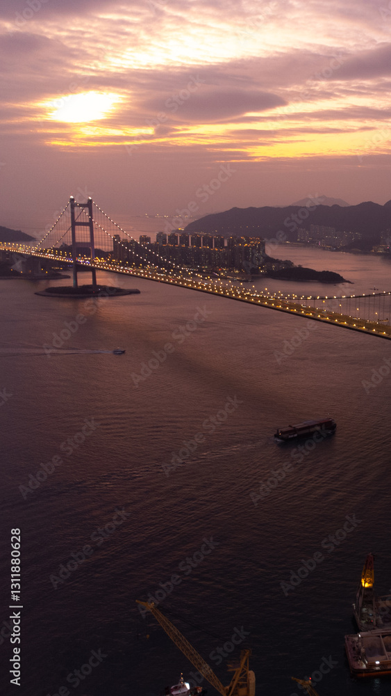 Aerial view of a bridge during sunset in Hong Kong Aerial view of a bridge during sunset in Hong Kong