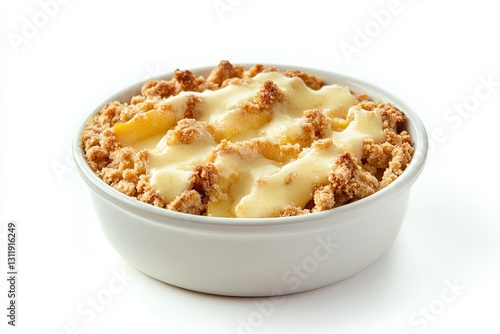 Warm apple crumble with custard sauce isolated on white background 