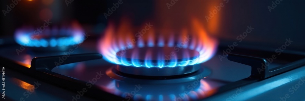 Efficient gas stovetop burner, blue and orange flames dancing , blue flame, cooktop Efficient gas stovetop burner, blue and orange flames dancing , blue flame, cooktop