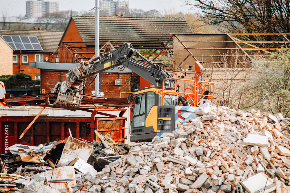 Construction machinery operates at a demolition site Construction machinery operates at a demolition site