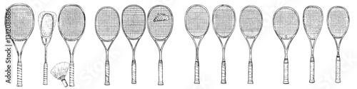 Various types of rackets displaying different designs and materials lined up on a display table