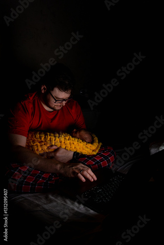 Obraz na płótnie Father Holding Baby While Using Laptop in Dim Light w salonie
